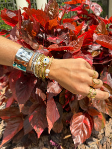 Twist Gold Bangle
